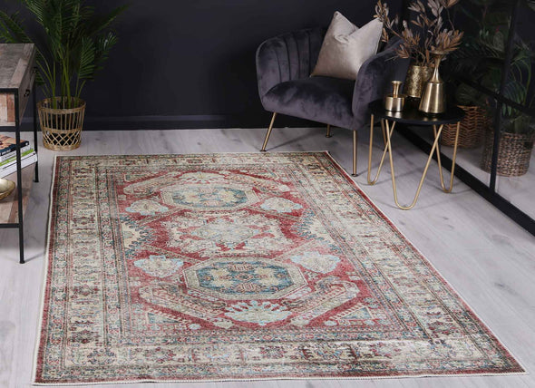 The Traditional Kazak Ruby rug is a stunning addition to any home, with its rich red hues and intricate pattern. It is designed to withstand heavy foot traffic and spills, with its water and stain-resistant properties and machine washable construction. Made with recycled cotton and featuring anti-allergen technology, this rug is both eco-friendly and practical.