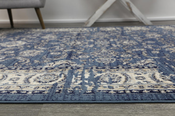 Arya Ziegler Distressed Navy Rug