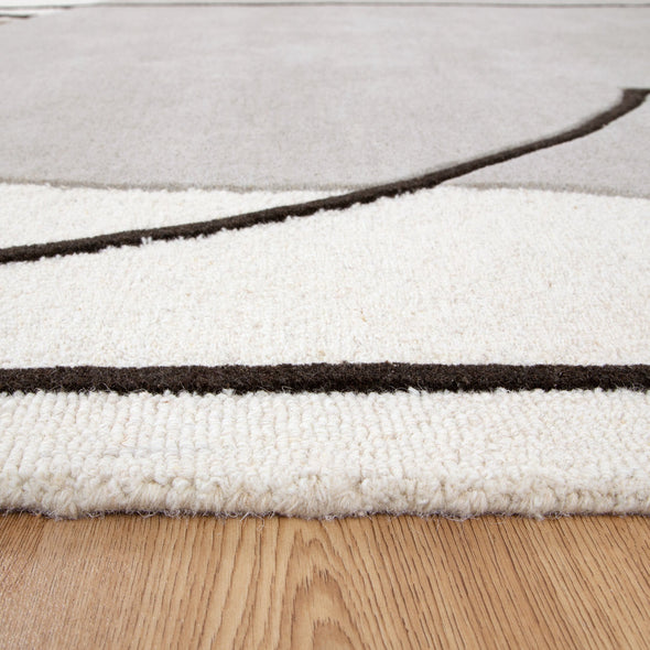 Les Nomades Minimal in Beige Wool Rug