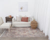 Agora Cairo Terracotta Wool Rug in living room with furnishings on blonde floorng