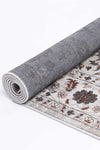 Almada Charcoal Floral Rug rolled