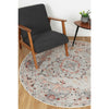 Image of the durable and stylish Sauville Rug from the Vintage Crown collection placed under a chair, highlighting its practicality with features like NanoWipe technology and machine washability.
